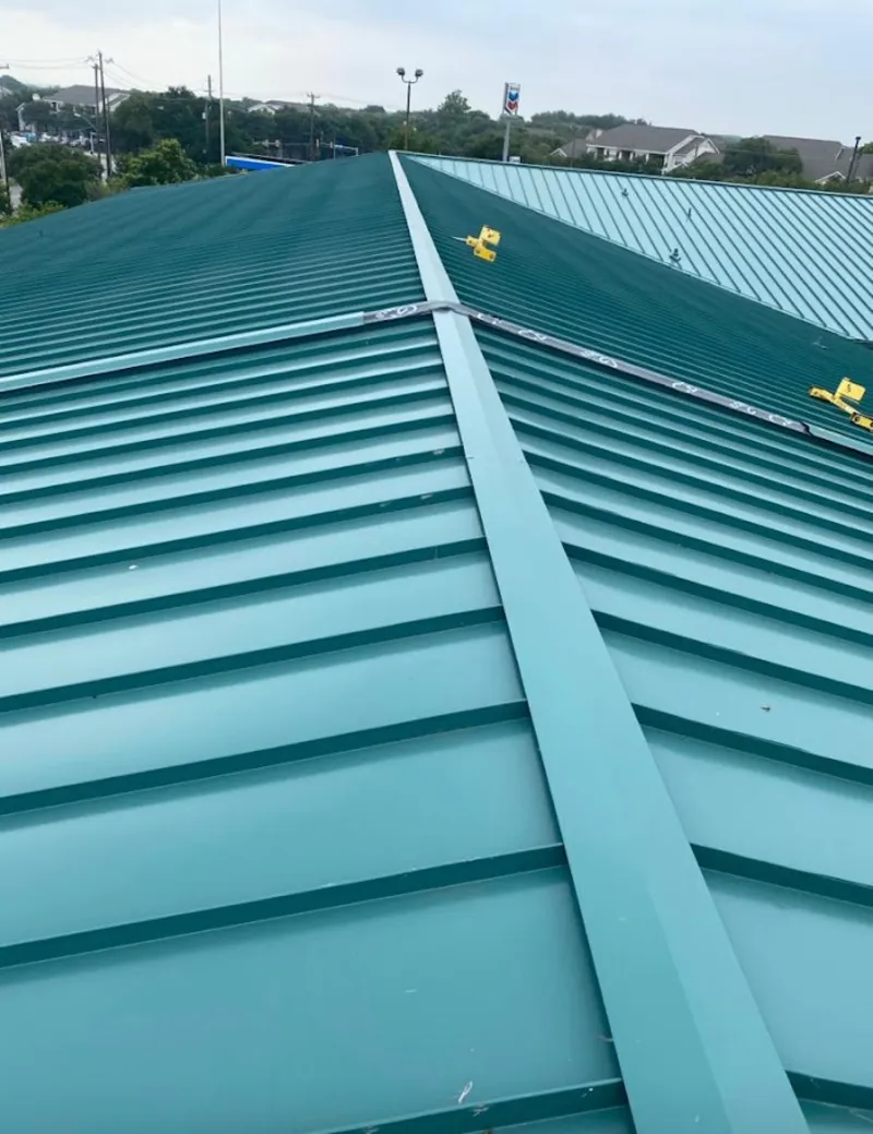 Green commercial metal roof ridge and valley for Metal Roof Repair in Urbana